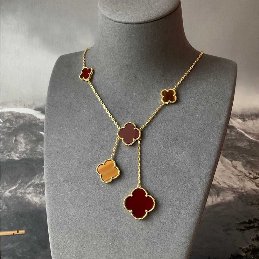 Elegant Gold and Red Clover Necklace